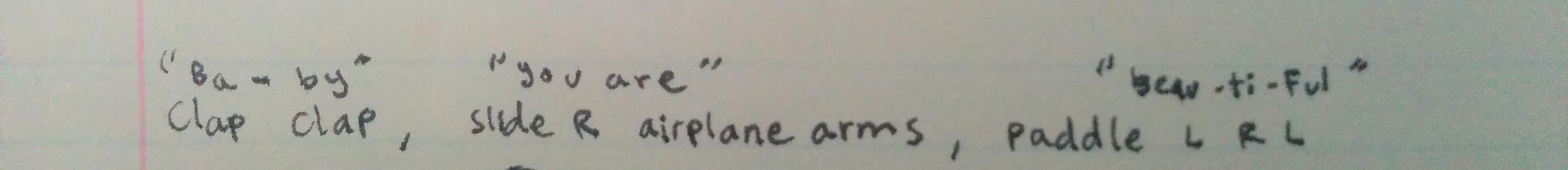 Paper with writing. "Clap clap, slide R airplane arms, paddle L R L." Includes song lyrics written above dance steps.