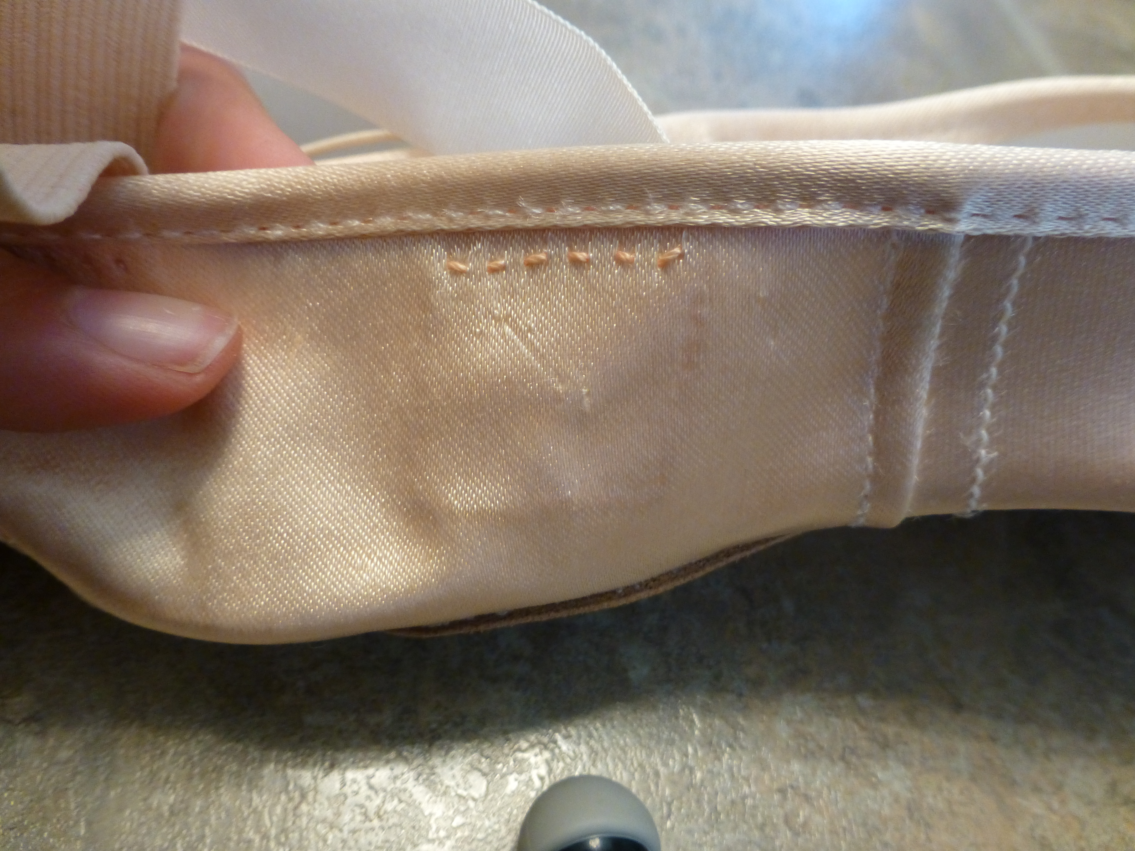 Finished pointe shoe ribbon, outside view