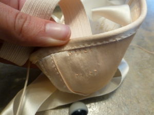 Finished pointe shoe elastic, outside view