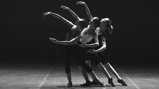 three female dancers in a lunge