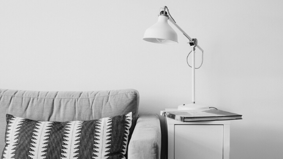 sofa, side table, and lamp